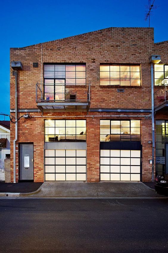 The Strelein Warehouse, located in Sydney, Australia, was converted into a 2-floor residence by Ian Moore Architects.